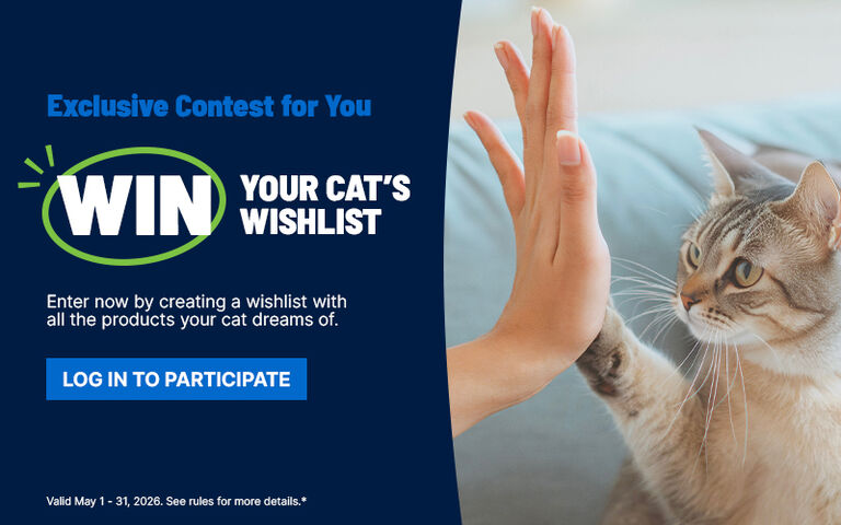 Exclusive contest promotion inviting shoppers to win their cat&rsquo;s wishlist by creating a wishlist, shown alongside a cat touching a raised hand and a Log In to Participate button.