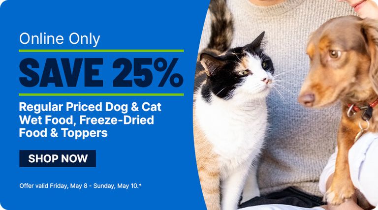 A promotional banner with a split layout. On the left side, a solid blue background features bold white and navy text that reads: &ldquo;Online Only SAVE 25% Regular Priced Dog & Cat Wet Food, Freeze-Dried Food & Toppers.&rdquo; Below the text is a dark button labeled &ldquo;SHOP NOW.&rdquo; Smaller text at the bottom states: &ldquo;Offer valid Friday, May 8 - Sunday, May 10.
