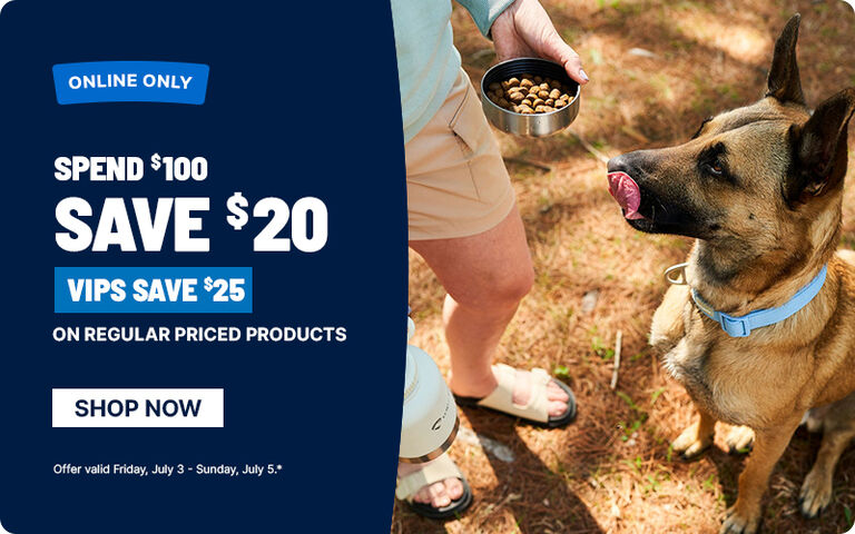 Online Only: Spend $100, save $20 on regular-priced products, or save $25 for VIPs. Shop now. Offer valid Friday, July 3&ndash;Sunday, July 5. Lifestyle image of a person holding dog treats next to a dog.