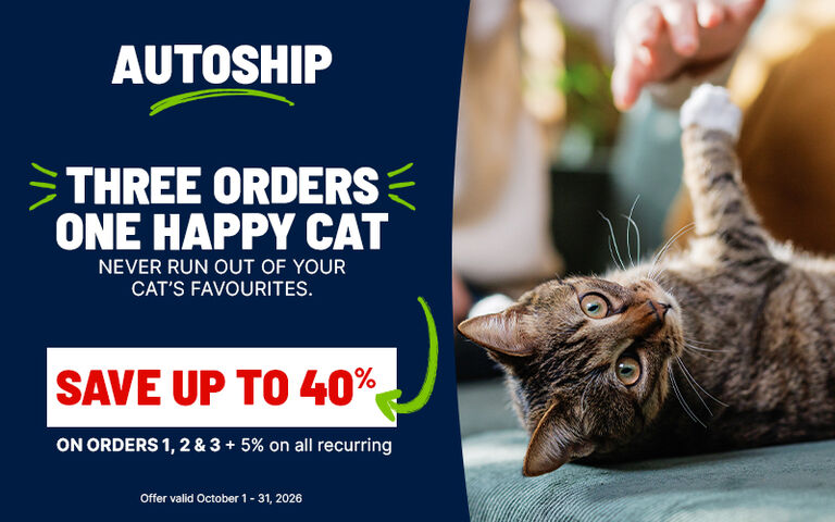 Cat relaxing on a sofa while being petted, alongside an Autoship promotion offering up to 40% off the first three orders of cat essentials and 5% off recurring orders.