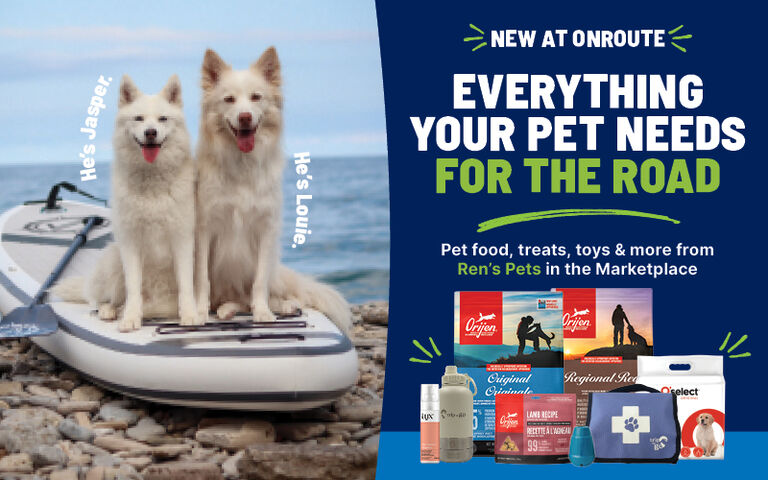 Promotional banner for Ren's Pets at ONroute featuring two white dogs sitting on a paddleboard by the water. Text reads, "New at ONroute. Everything Your Pet Needs for the Road." The banner highlights pet food, treats, toys, and travel essentials available from Ren's Pets in the Marketplace, alongside featured products including Orijen pet food, treats, a travel water bottle, grooming spray, waste bags, a pet first aid kit, and Select dog treats.